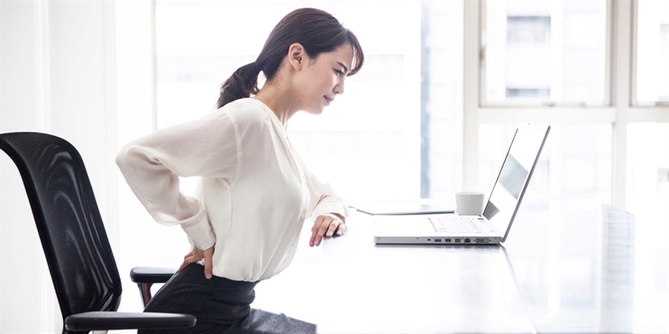 Vì sao ngồi nhiều lại hay bị đau thắt lưng và làm thế nào để giảm bớt cơn  đau?