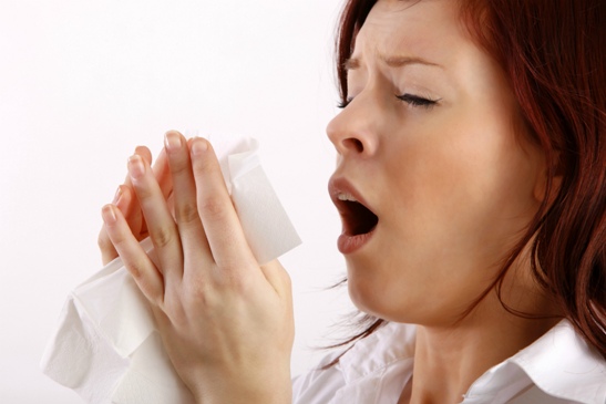 Sneezing woman.med